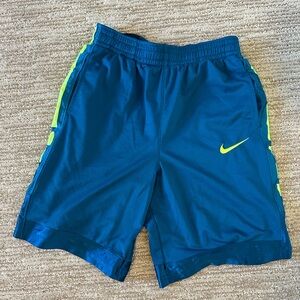 teal nike basketball acyive shorts with green details size kids xl